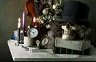 Answer SKULL, WIG, CANDLE, VIOLIN, ALARM CLOCK, TOP HAT, FLAME, MARBLE
