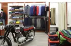 Answer MOTORCYCLE, TROUSERS, SADDLE, MIRROR, JACKET, BELT, FITTING ROOM, EXHAUST PIPE